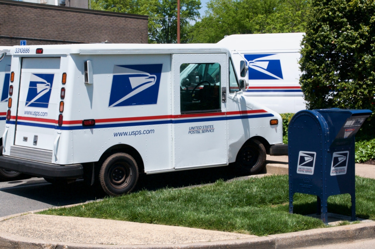 Image of USPS truck and mailbox, © 2020 George Linzer