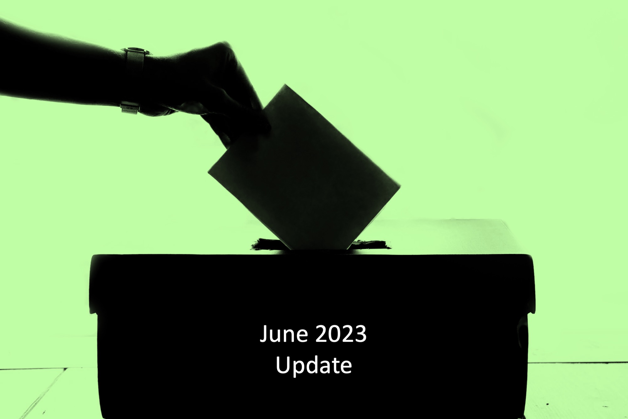 Hand drops ballot into box – June 2023 update