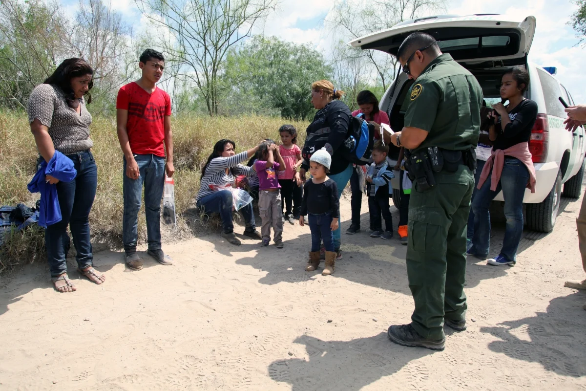 Border patrol detains Central Americans who illegally crossed the Rio Grande in search of asylum